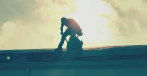 Gean Roofing Contractor performing roof repairs.