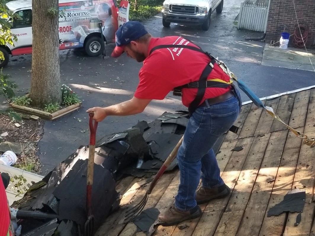 Tearing off old roofing