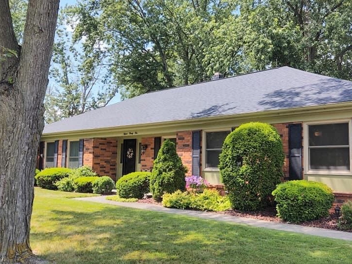 Brick ranch hip roof