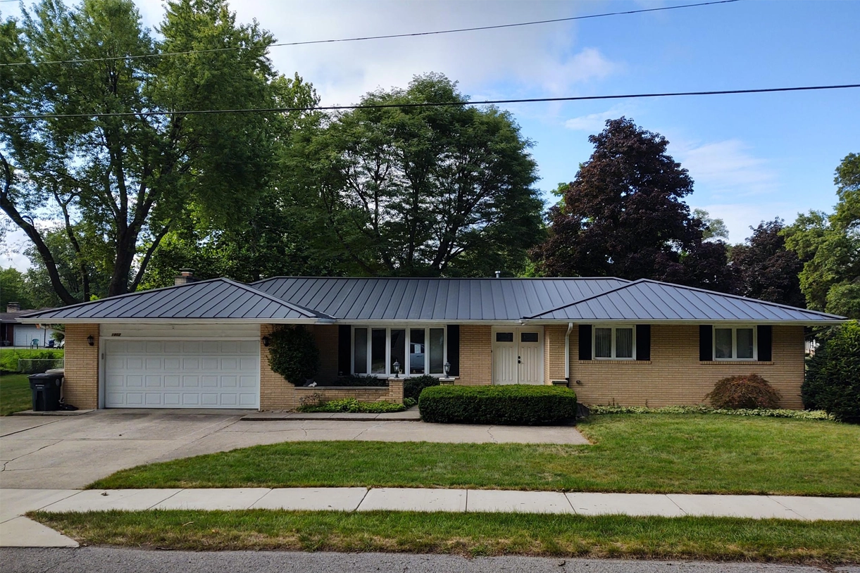 Working on Slate Roof Replacement